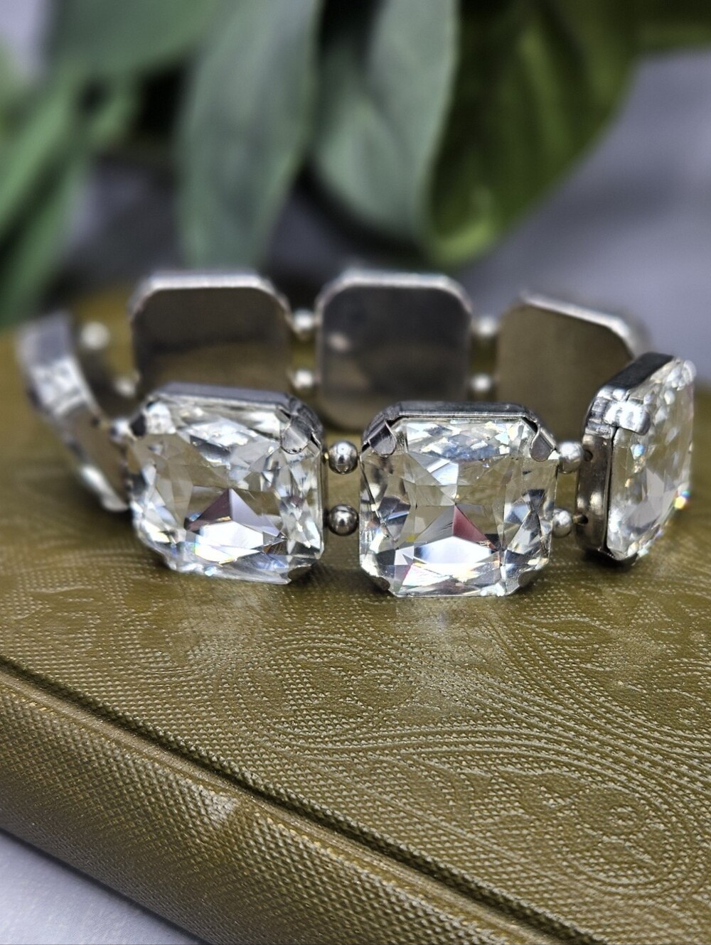 Vintage-style chunky statement bracelet featuring oversized, faceted clear rhine